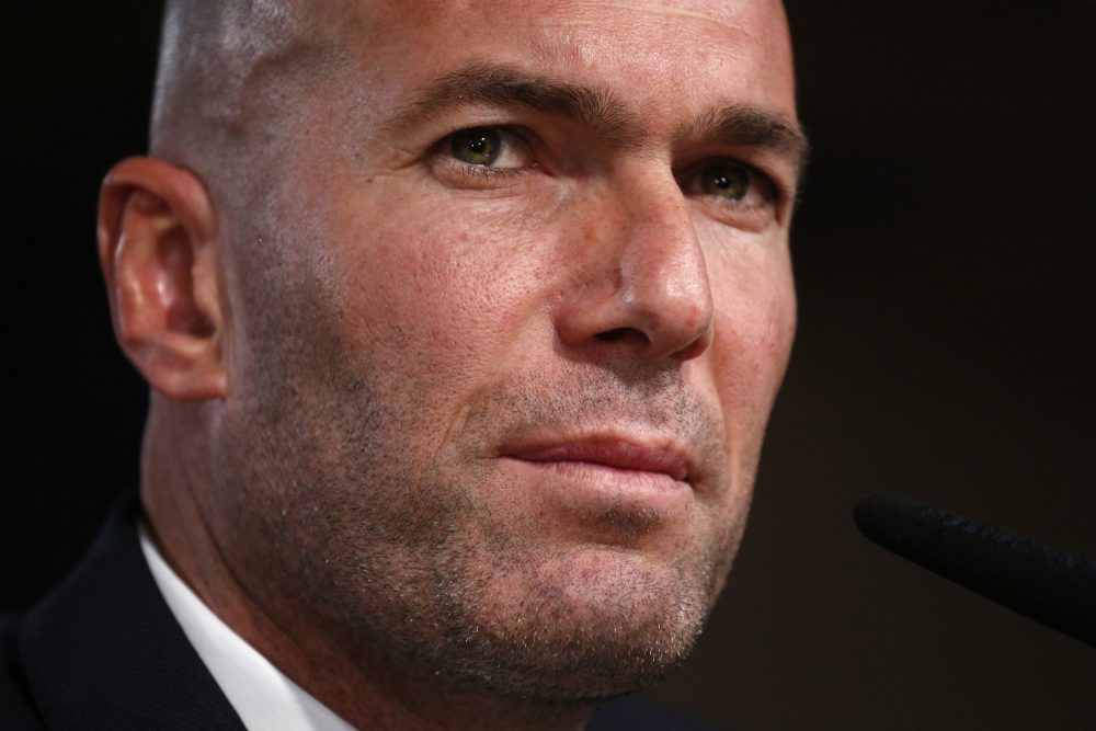 Real Madrid's new coach Zidane attends a news conference at Santiago Bernabeu stadium in Madrid