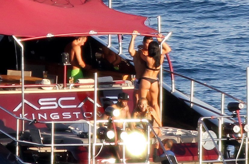 EXCLUSIVE: Cristiano Ronaldo enjoys the sun the ocean and the company of some female friends as the Real Madrid Supper Star is seen aboard a boat in Ibiza Spain Pictured: cristiano ronaldo and girls Ref: SPL1294677 030616 EXCLUSIVE Picture by: Silvia & Sergio / Splash News Splash News and Pictures Los Angeles: 310-821-2666 New York: 212-619-2666 London: 870-934-2666 photodesk@splashnews.com 